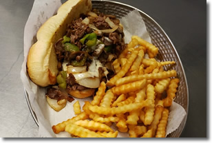 Enjoy the Philly Cheese Steak Sandwich at the Ice Cracking Lodge.