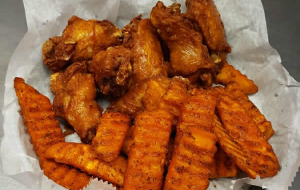 Get buffalo wings at the Ice Cracking Lodge